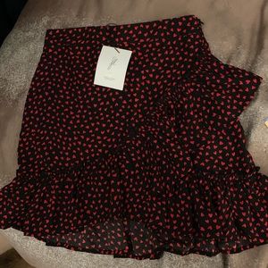 NWT Flair Label black skirt w/ red hearts Sz S